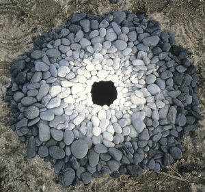 Stones as Andy Goldsworthy enviromental art photographs 